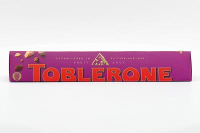 Шоколад швейцарский Toblerone молочный с медово-миндальной нугой с изюмом и орехом 100 гр